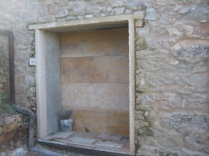 Doors through stone house walls,penelahouse